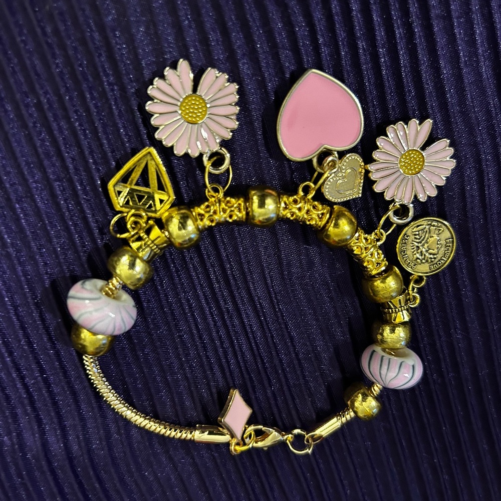 Gold and Pink Charm Bracelet with Heart and Flower Charms